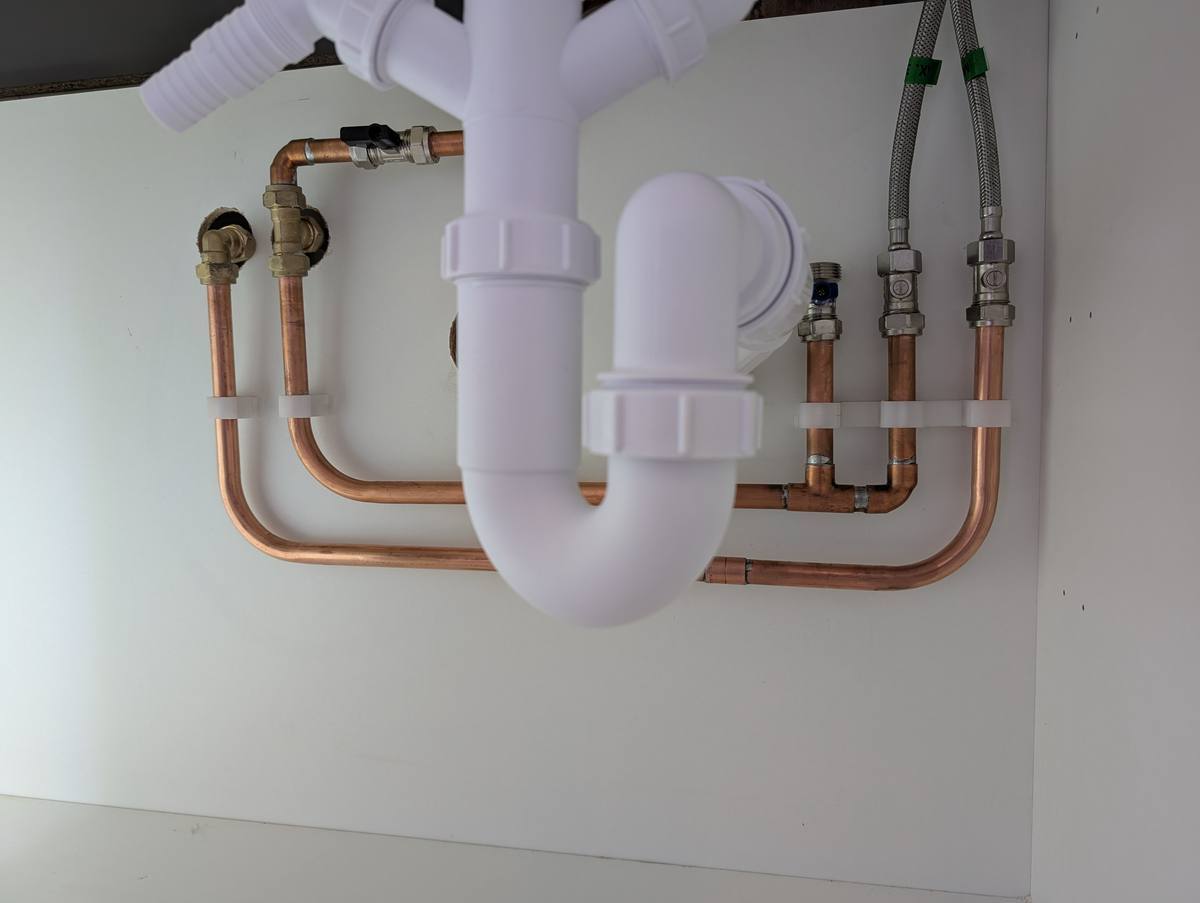 Copper pipework and plumbing alterations under sink