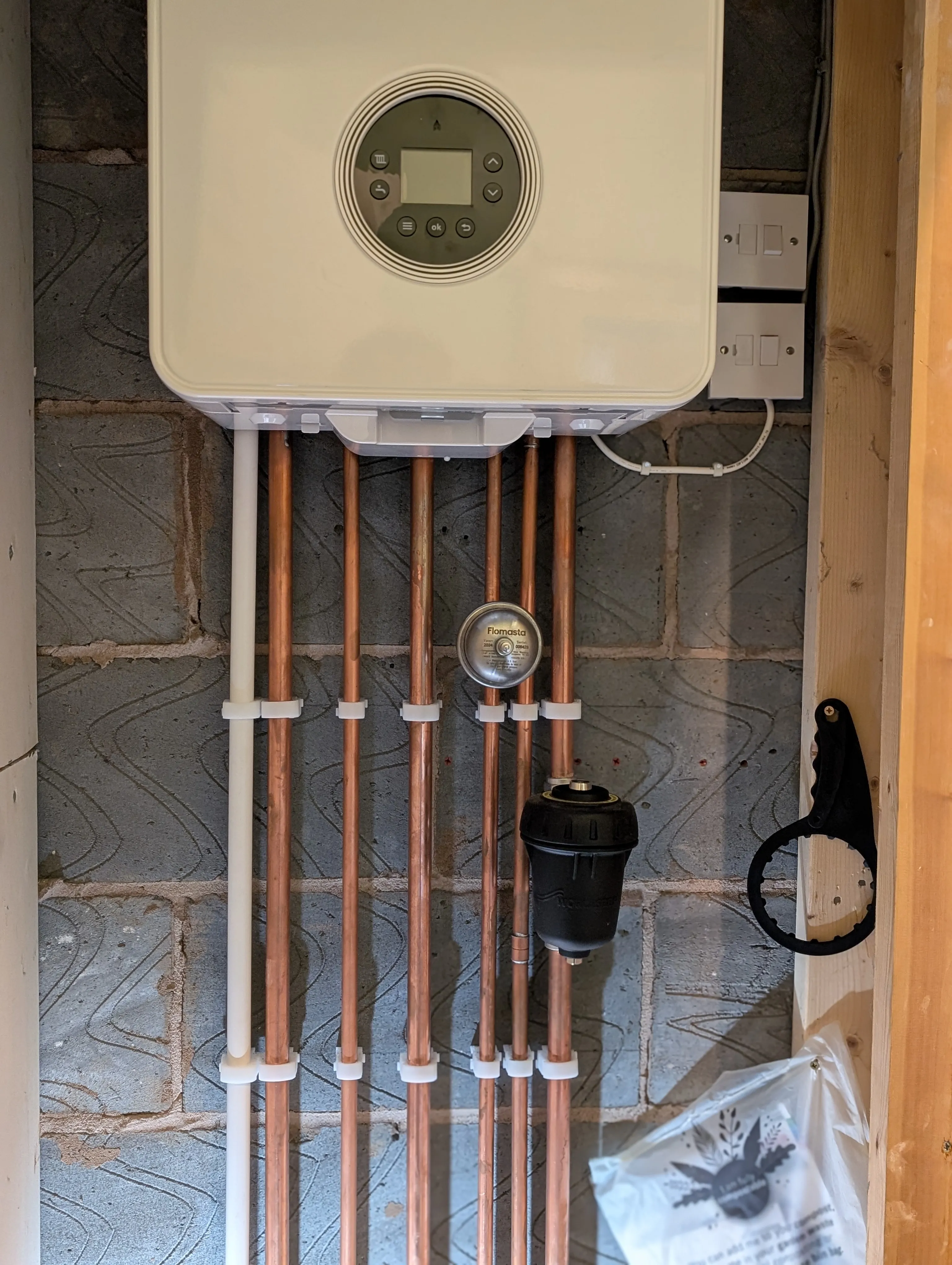 Combi boiler installation with copper pipework Wrexham