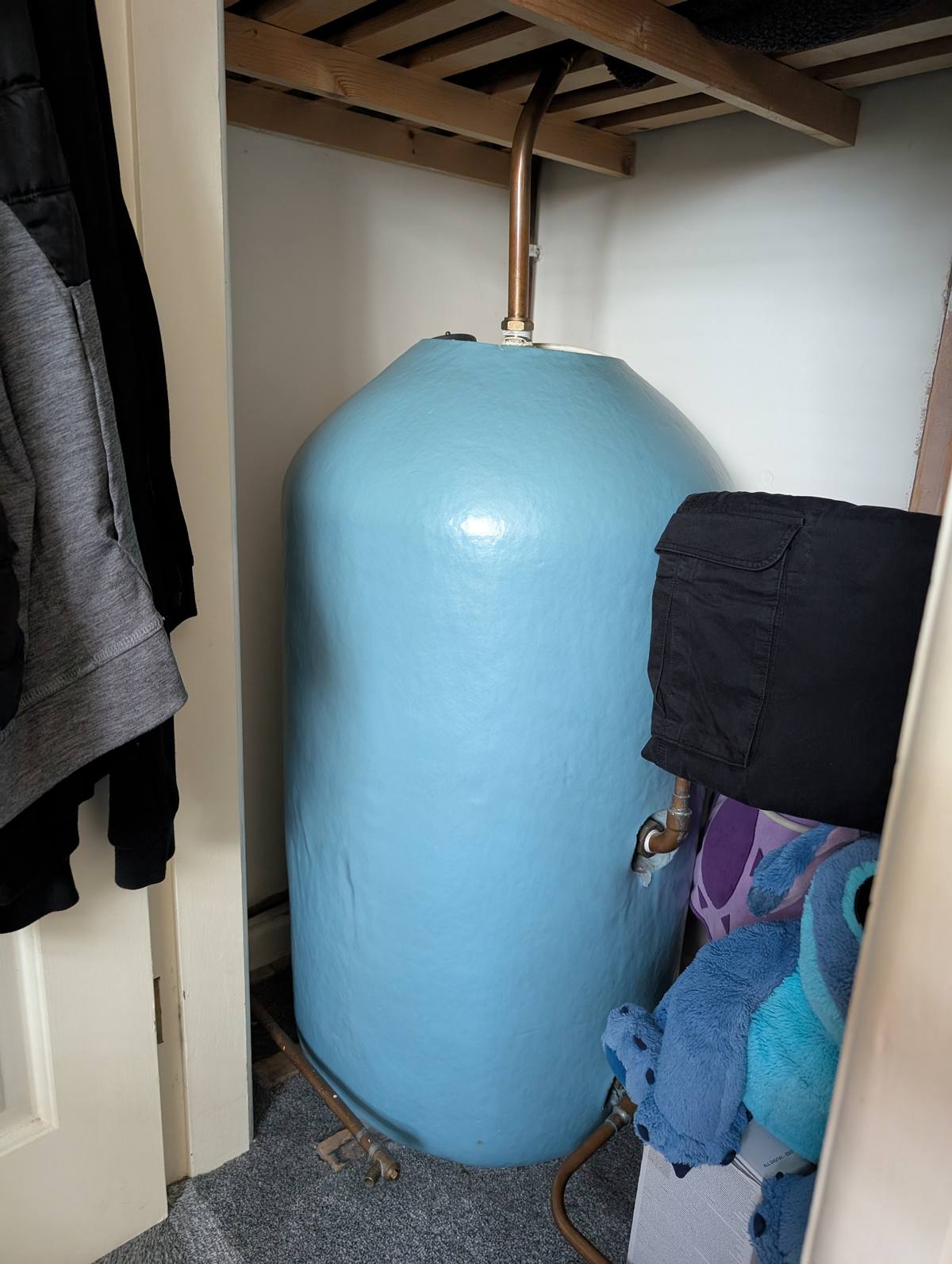 Before - old hot water cylinder and boiler system Wrexham