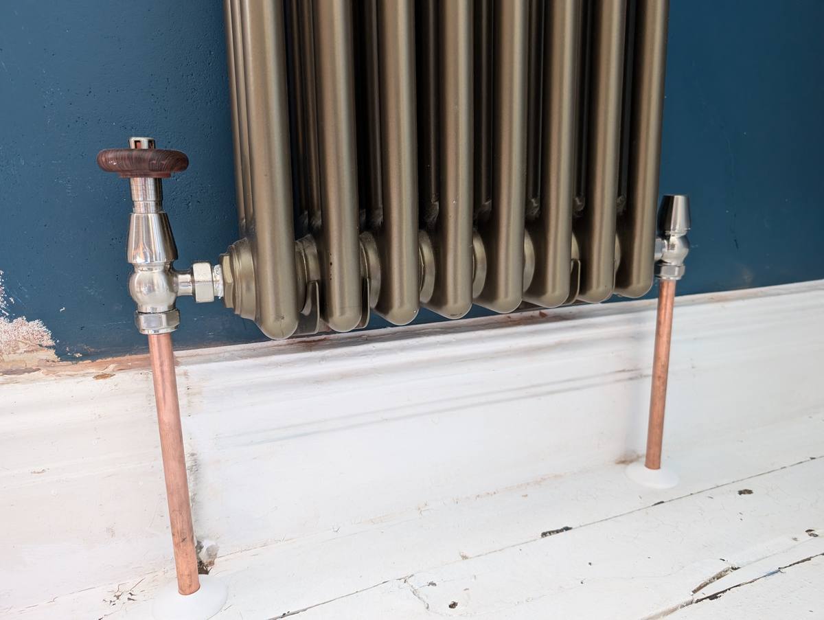 Traditional radiator installation with copper pipework Oswestry